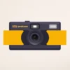 Appareil photo peeksme jaune + 1 paire de clips vert + 1 lanière bleue