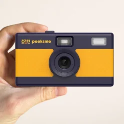 Appareil photo peeksme jaune + 1 paire de clips vert + 1 lanière bleue