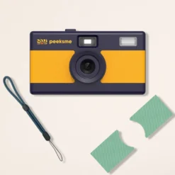 Appareil photo peeksme jaune + 1 paire de clips vert + 1 lanière bleue