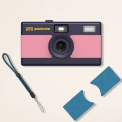 Appareil photo peeksme rose + 1 paire de clips bleu + 1 lanière bleue