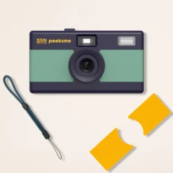 Appareil photo peeksme vert + 1 paire de clips jaune + 1 lanière bleue