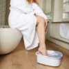Bain de pieds massant par bouillonnement et vibrations