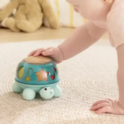 Boîte à musique tortue d'éveil rotative Hape