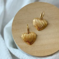 Boucles d'oreilles créoles dorées en acier inoxydable avec pendentif cœur lova