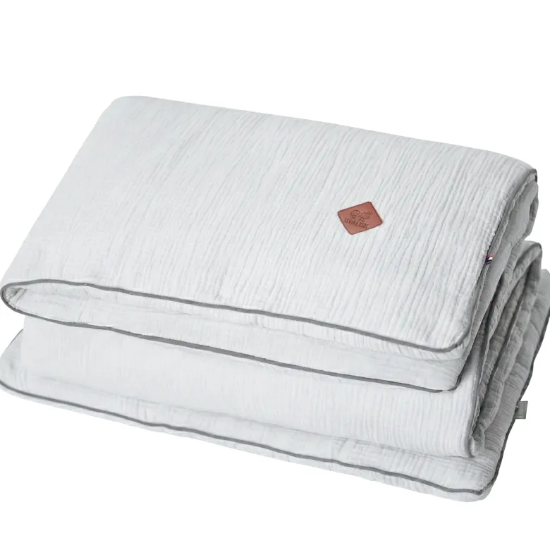 Couette et oreiller prêt à dormir