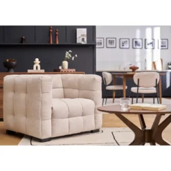 Fauteuil en tissu effet velours texturé beige corto