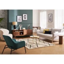Fauteuil en tissu effet velours bleu canard et métal noir maxine
