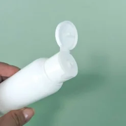 Flacon 100 ml transparent avec pompe crème or