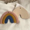 Hochet de dentition arc en ciel moutarde
