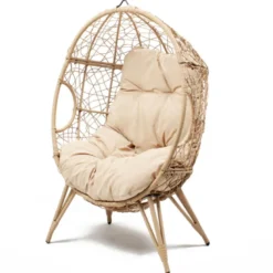 Jane fauteuil œuf sur pied en résine beige effet rotin