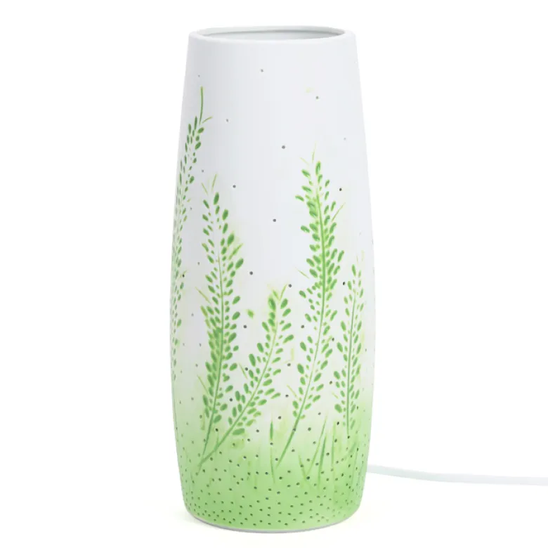 Lampe de table en porcelaine ajourée motif végétal