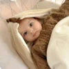 Nid d'ange bébé moumoute beige