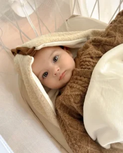 Nid d'ange bébé moumoute beige