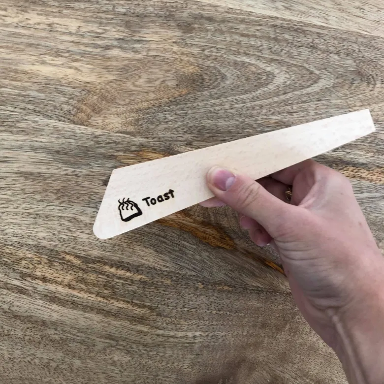 Pince à toast en hêtre
