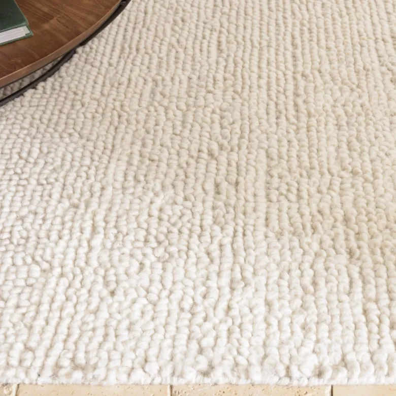 Sacha - tapis rectangulaire 200x290cm en laine bouclée couleur beige
