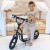 Trottinette enfant avec grandes roues gonflables et freins à main